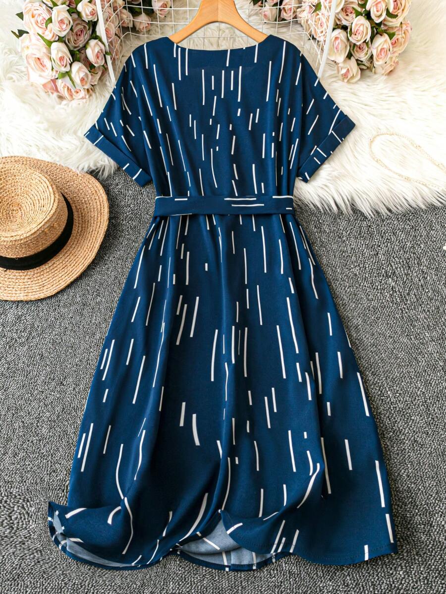 Coria Navy Blue Belted Midi Dress with Abstract Stripe Print